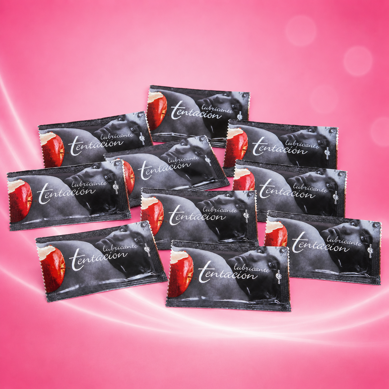 Zehn Einzeldosis-Sachets Gleitgel Tentacion, schwarze Verpackung mit rotem Erdbeermotiv, gestapelte Anordnung